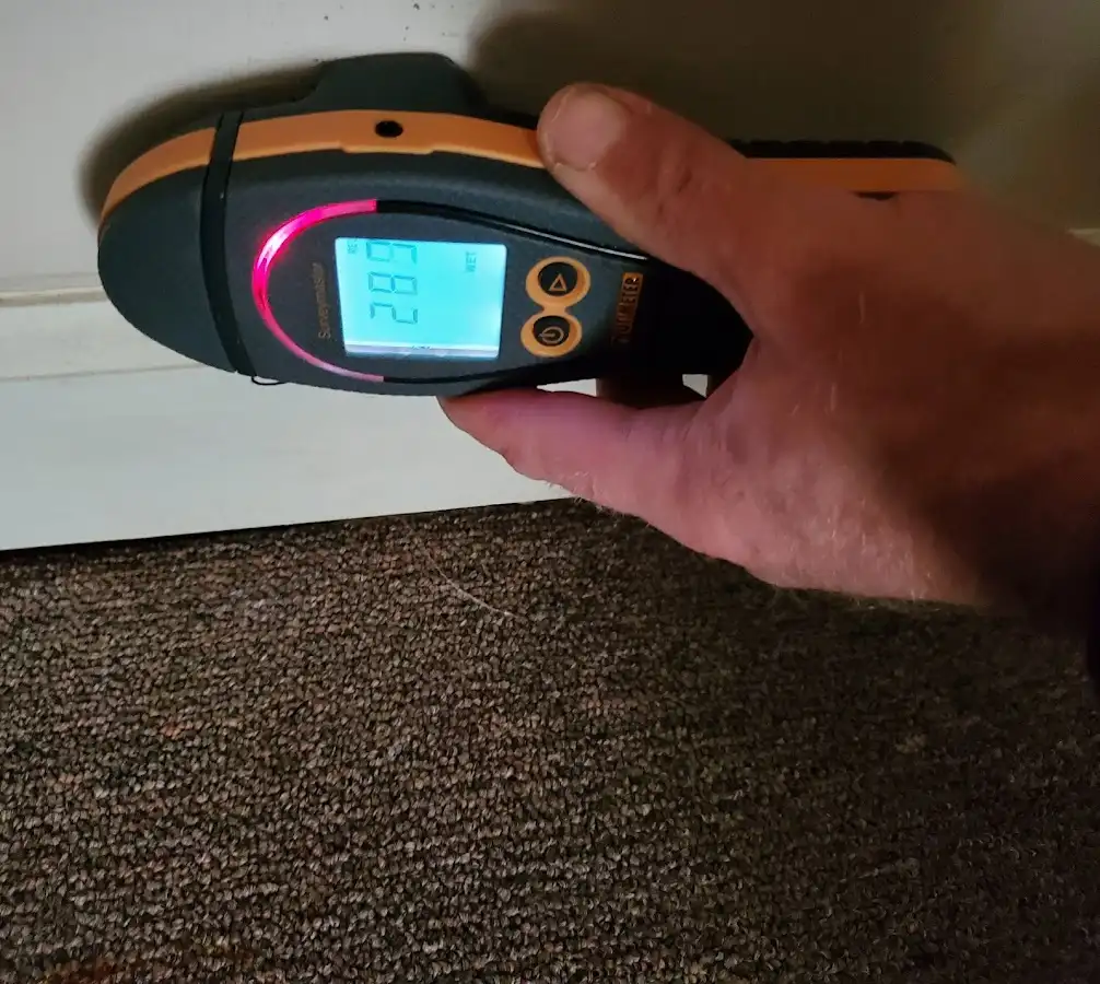 Moisture detection at baseboard during Storm Damage Restoration in Baker City